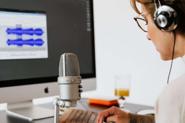 person speaking into microphone